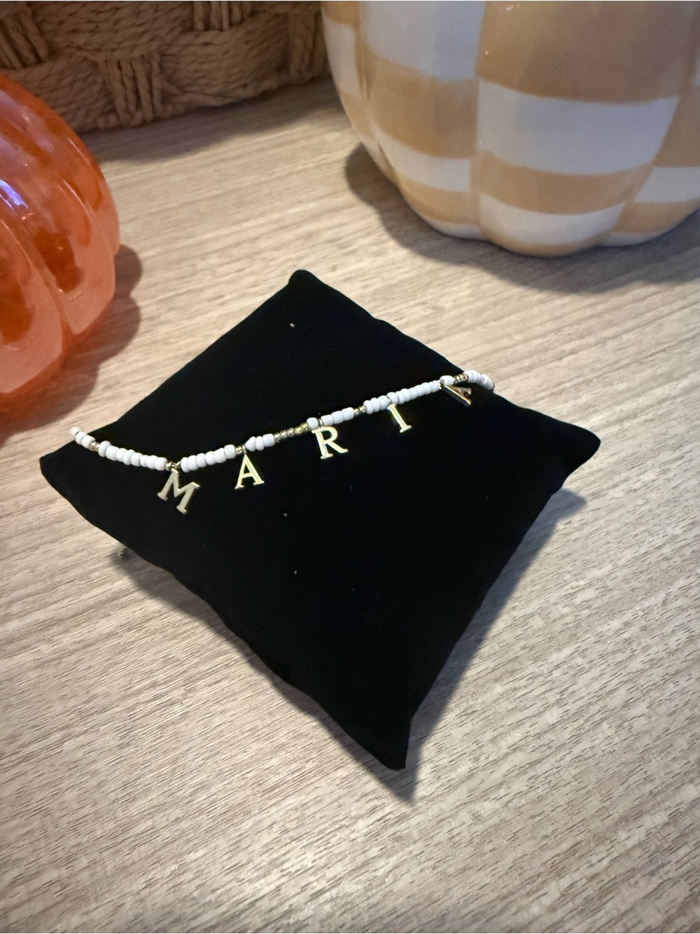 Customizable White Beaded 'MARIA' Name Bracelet with Gold  plated Letter Charms